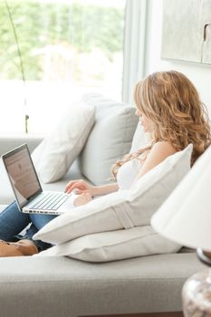 young beautiful woman using laptop computer