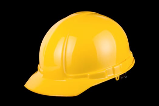 Yellow helmet isolated on a black background