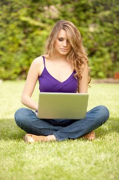 young beautiful woman using laptop computer