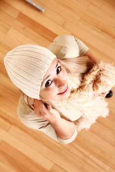 A young woman posing in winter clothing.