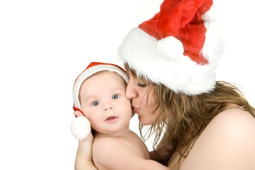 Beautiful mommy santa and her baby Santa boy on a white