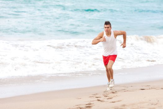 young handsome man jogging outdoors