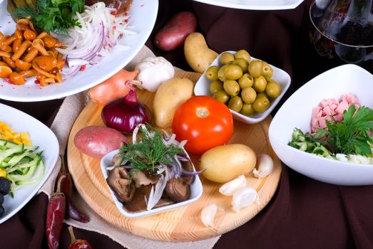 Many food dishes on the restaurant table