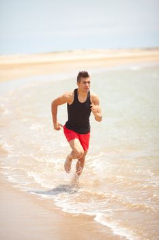 young handsome man jogging outdoors