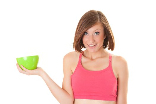 young beautiful sport woman laughing with a bowl isolated on white background