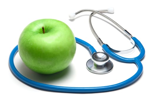 Green apple with stethoscope isolated