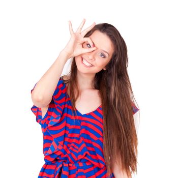 young beautiful women making hole gestures on face on white background