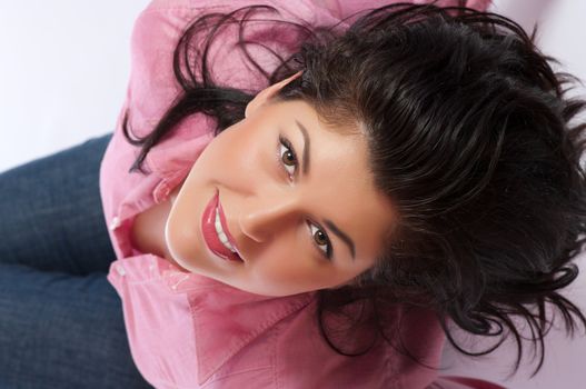 Young smiling woman in red shirt