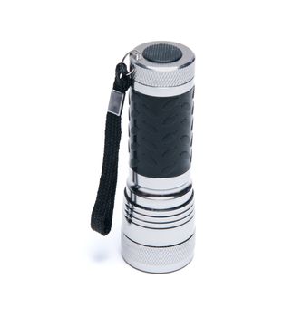 Portable metallic torchlight isolated on white