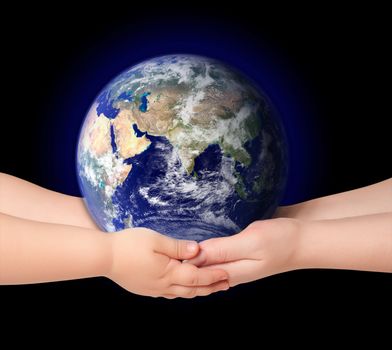 Child and woman holds earth globe on black