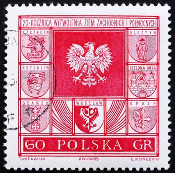 POLAND - CIRCA 1965: a stamp printed in the Poland shows Polish Eagle and Town Coats of Arms, 20th Anniversary of regaining Western and Northern Territories, circa 1965