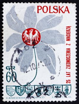 POLAND - CIRCA 1970: a stamp printed in the Poland shows Flower, Polish Eagle and Town Coats of Arms, 25th Anniversary of Victory over Germany, circa 1970