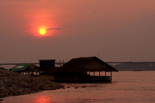 sunset at mekong river, thailand and laos
