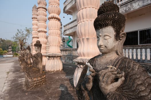 Ancient Buddha in Sala Kaew Ku, - Thai temple in hindu style, Nhongkhai Province Thailand 