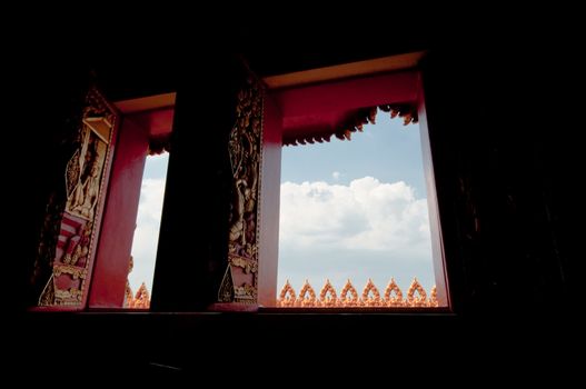 Arts on windows of Phramahathat Khannakhon tower, Khonkaen Province in Northeastern of Thailand
