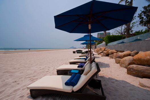 beach chairs locate on Hua Hin beach in Thailand