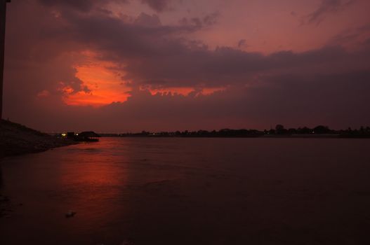 sunset at mekong river, thailand and laos