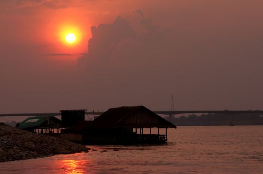 sunset at mekong river, thailand and laos