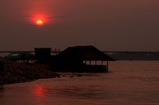 sunset at mekong river, thailand and laos