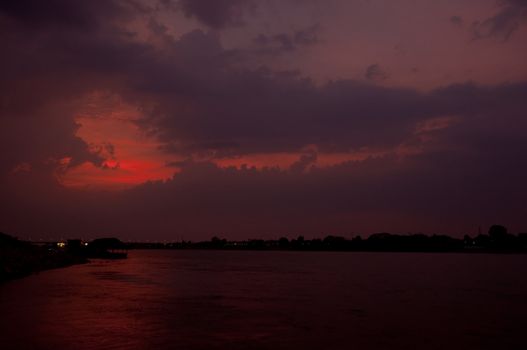 sunset at mekong river, thailand and laos