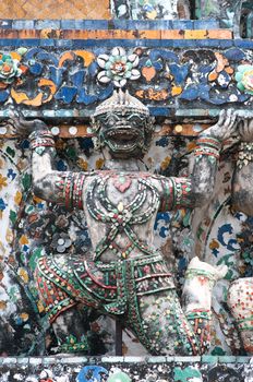 ancient Hanuman figure in Wat Arun around pagoda, Bangkok Thailand