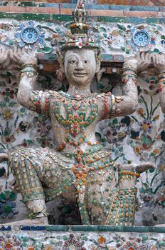 ancient figure in Wat Arun around pagoda, Bangkok Thailand