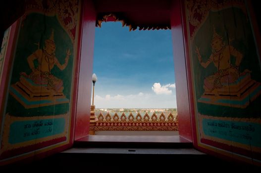 Arts on windows of Phramahathat Khannakhon tower, Khonkaen Province in Northeastern of Thailand