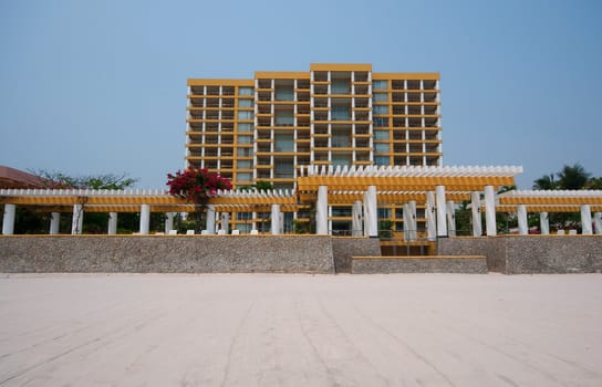 yellow building next to Hua Hin beach in Thailand