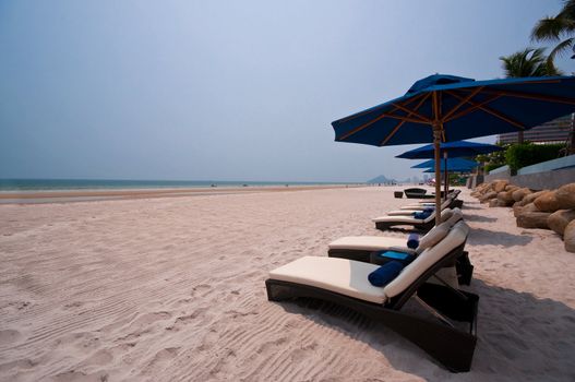 beach chairs locate on Hua Hin beach in Thailand