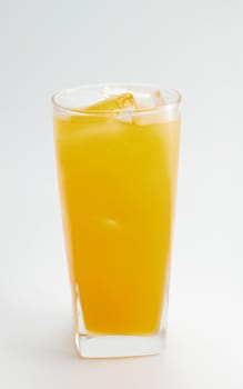 a glass of orange juice on white background