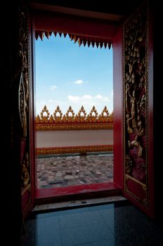 Arts on windows of Phramahathat Khannakhon tower, Khonkaen Province in Northeastern of Thailand