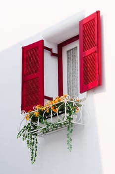 red vintage windows in Greek Style