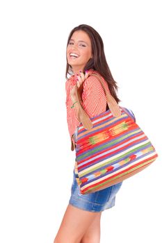 young beautiful women walking with a colorful bag on white background