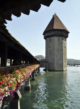 Famous covered wooden footbridge in Lucerne, Switzerland