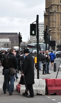 Businessman in London. Men in suit, walking. Europe.