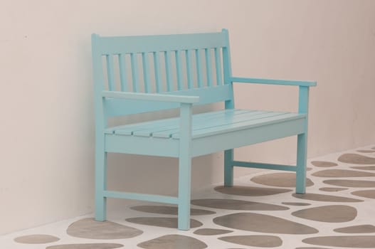 light blue street chair in the park
