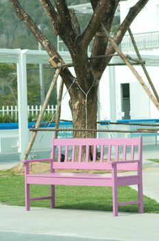pink street chair in the park