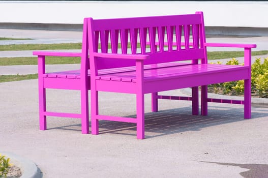pink street chair in the park