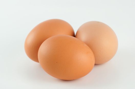 three eggs on a white background 