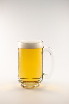 glass of beer on white background