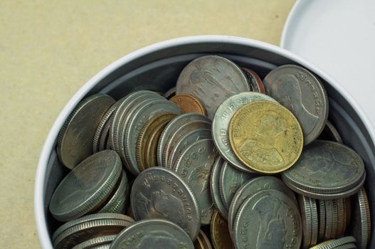 group of Baht coins on table