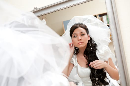a bride in a mirror