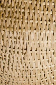 Wicker fragment background. Handmade interesting wooden backdrop.