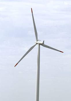 Wind generator against sky, view from below