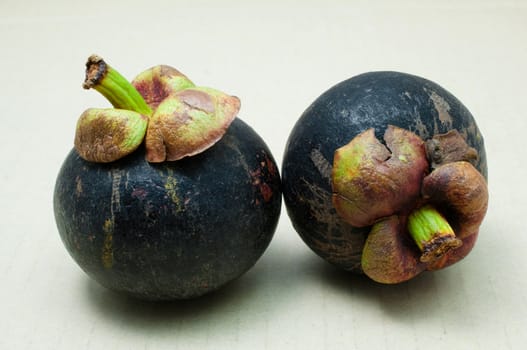 mangosteens on white background