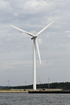 Wind generator on a river coast, Denmark