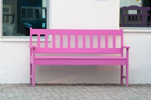 pink street chair in the park