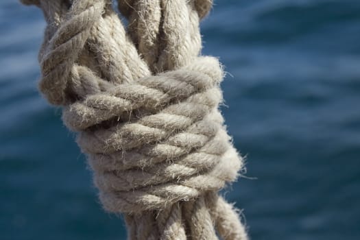 Knot on a rope against sea water