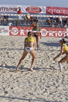 NAPLES - JULY 07: italian professional players have a competition at Italian beach volley female tournament on July 07, 2012 in Naples Italy