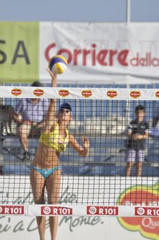 NAPLES - JULY 07: italian professional players have a competition at Italian beach volley female tournament on July 07, 2012 in Naples Italy